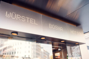 Unique design of Bitzinger Würstelstand, blending contemporary style with classic Viennese charm.