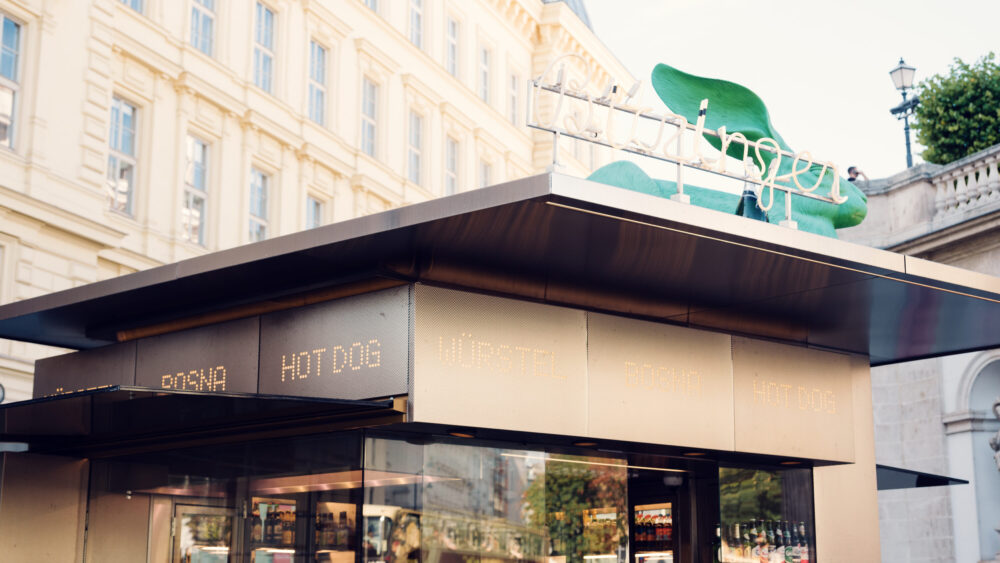 Distinctive architecture of Bitzinger Würstelstand, a modern twist on Vienna's traditional street food stands.