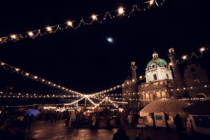 Christmas market atmosphere in front of St. Charles Church (Karlskirche).