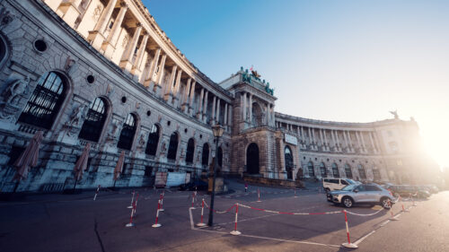 Grand entrance of the Österreichische Nationalbibliothek, showcasing its architectural beauty.