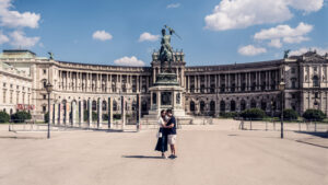 Scenic view of Hofburg Palace from the Heldenplatz, capturing its majestic architecture.