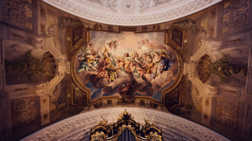An ornate ceiling fresco inside St. Charles Church (Karlskirche).