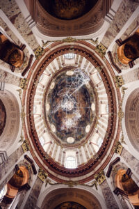 The stunning domed ceiling of St. Charles Church (Karlskirche) in Vienna