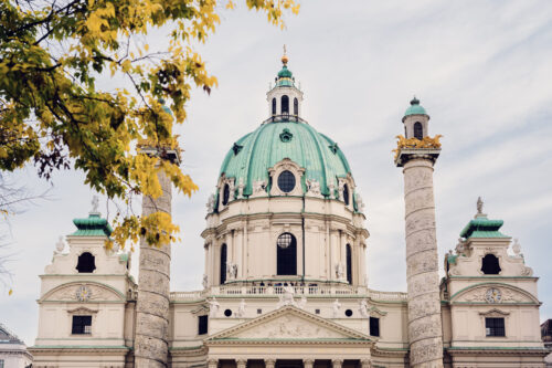 The majestic dome and twin columns of St. Charles Church (Karlskirche) in Vienna.