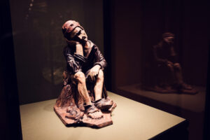 Resting Reaper by Andrea Briosco, known as Riccio, in Room XXXIII of the Kunstkammer at the Kunsthistorisches Museum Vienna.