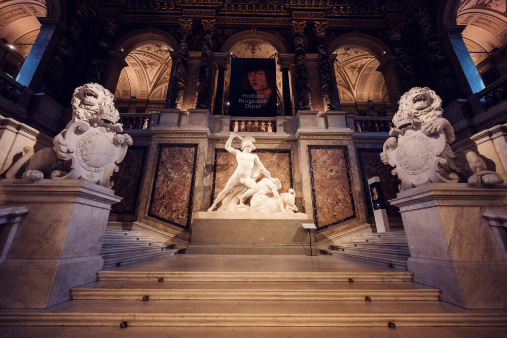 The magnificent central staircase at the Kunsthistorisches Museum Vienna showcases Antonio Canova's 'Theseus and the Centaur'