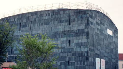 Exterior of MUMOK Vienna (Museum of Modern Art) with its distinctive dark basalt cube architecture.