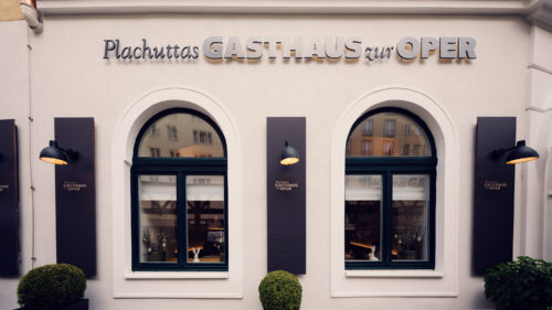 Elegant entrance of Plachutta's Gasthaus zur Oper.