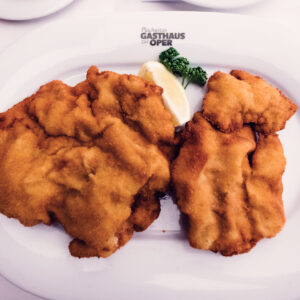 Artfully prepared Wiener Schnitzel presentation at Plachuttas Gasthaus zur Oper.
