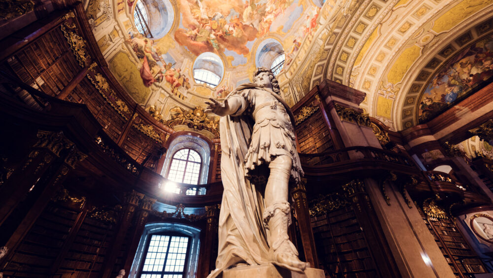 Charles VI statue standing proudly in the Prunksaal.