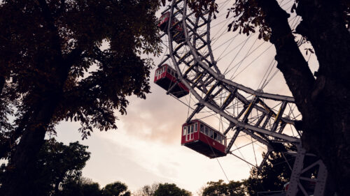 Majestic Giant Ferris Wheel (Wiener Riesenrad), its historic structure creating a dreamy atmosphere.