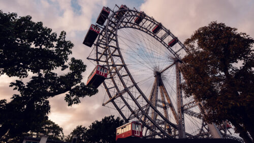 Majestic Giant Ferris Wheel (Wiener Riesenrad) bathed in golden hour light.