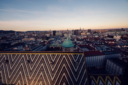 Evening light on the St. Stephen's Cathedral towers creating dramatic shadows.