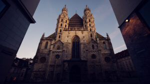 Morning light illuminating the St. Stephen's Cathedral intricate stone facade, perfect for architectural photography.