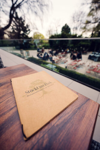Stöckl im Park's elegant menu card featuring seasonal Austrian cuisine.