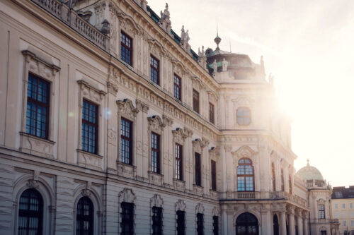 Play of light and shadow across Upper Belvedere's ornate facade.