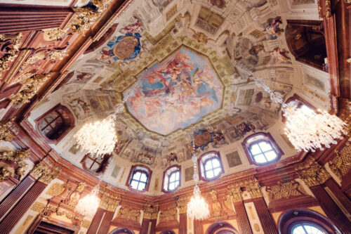 Intricate ceiling frescoes in Marble Hall depicting allegorical scenes, perfect for architectural detail photography.