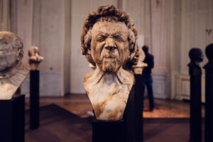 Intimate gallery of baroque busts at Belvedere Castle.