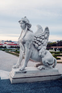 Historic stone vases and sculptures in Belvedere Castle's formal gardens.