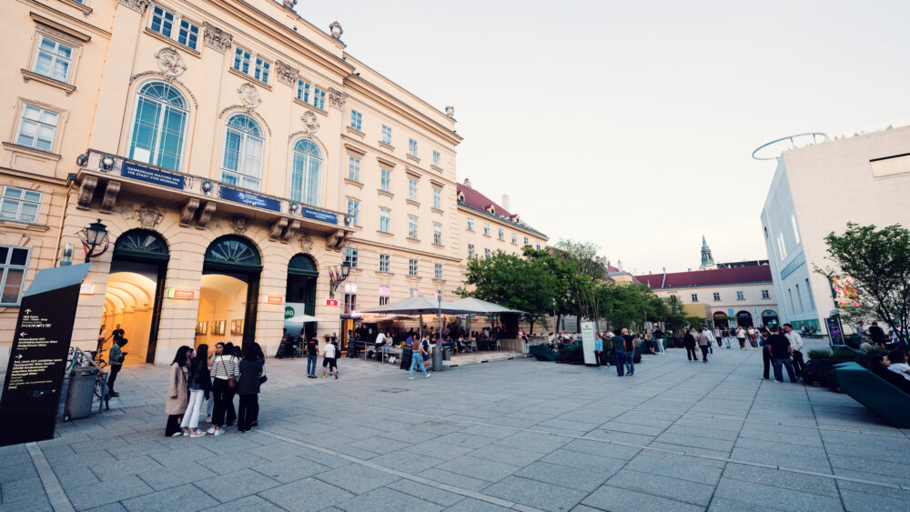 Historic imperial stables facade of MuseumsQuartier showcasing baroque architectural details.