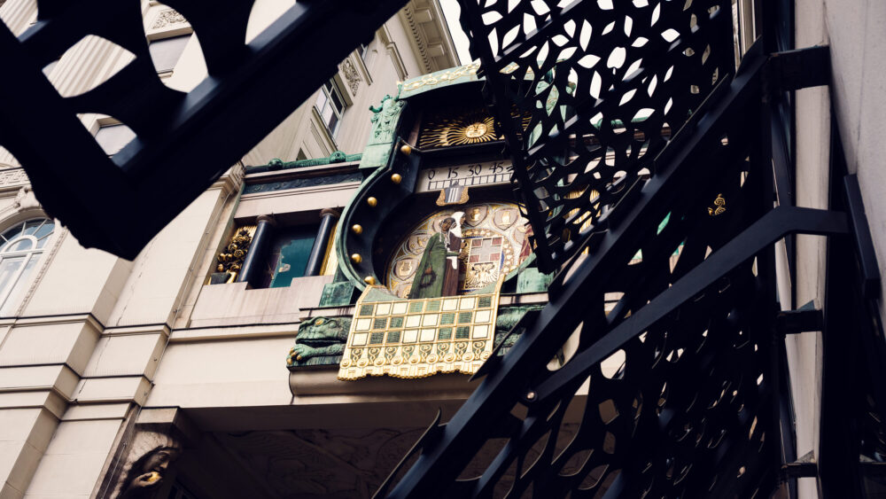 Detailed copper work of Anker Clock's Art Nouveau facade, showcasing Franz von Matsch's masterful design.