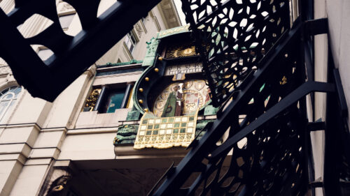 Detailed copper work of Anker Clock's Art Nouveau facade, showcasing Franz von Matsch's masterful design.