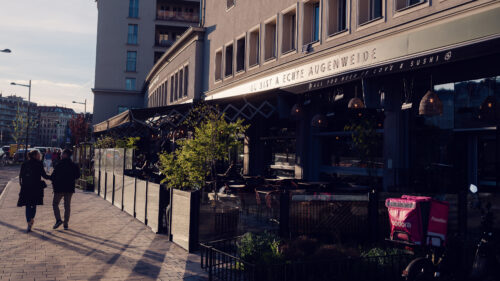 Elegant dining setup at Augenweide in Vienna, showcasing international flavors.