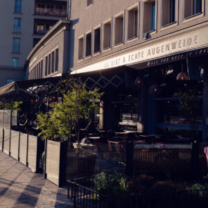 Elegant dining setup at Augenweide in Vienna, showcasing international flavors.