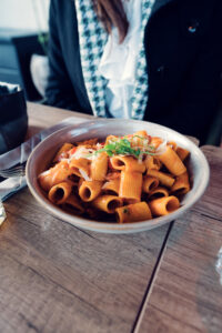 Artfully prepared pasta dish at Augenweide, blending Italian influences.