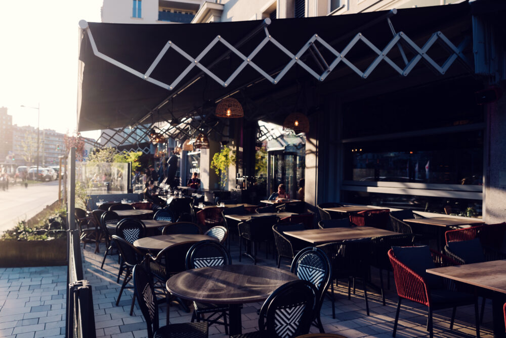 A sunny summer day on the outdoor terrace of augenwide in Vienna.