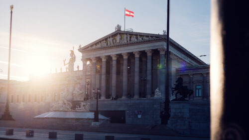 Austrian Parliament's elegant staircases and grand columns.