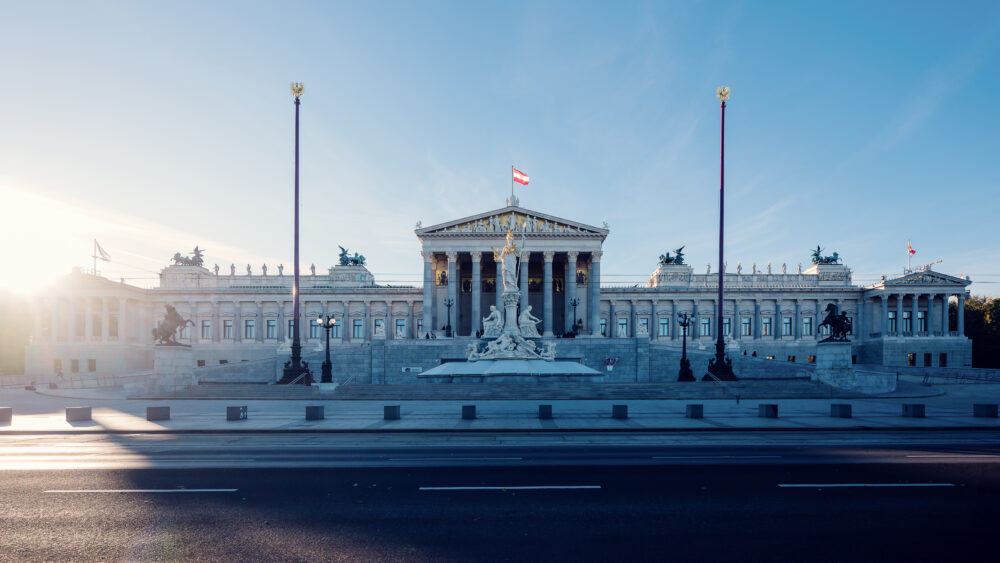 Historic Austrian Parliament building, a symbol of democracy in Vienna.