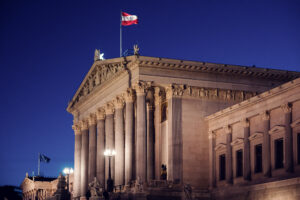 Austrian Parliament's iconic facade, blending history with modernity.