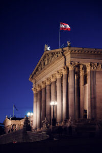 Austrian Parliament's iconic facade, blending history with modernity.