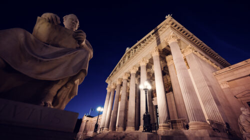 Detailed sculptures adorning the Austrian Parliament's exterior.