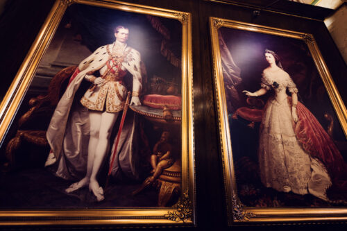 Portraits of Empress Sissi and Emperor Franz Joseph at Café Central, capturing the elegance and historical charm of Vienna's imperial past.