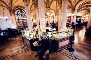 Elegant marble columns and historic ambiance at Café Central, Vienna.