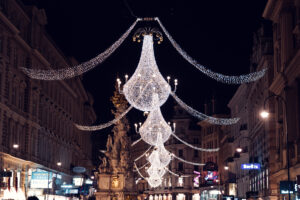 During the holiday season, the Graben is beautifully adorned with festive Christmas lights, creating a magical atmosphere.