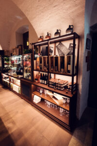 Display of fine wines and regional specialties at the shop of Heuriger Mayer am Pfarrplatz.