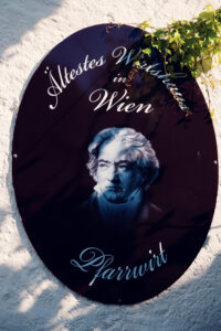 Historic Beethoven memorial plaque at Pfarrwirt, commemorating the composer's visits to Vienna's oldest restaurant.