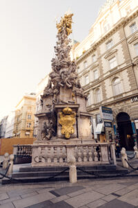 The Plague Column ("Pestsäule") was commissioned by Emperor Leopold I and features gilded sculptures and heavenly scenes symbolizing divine intervention.