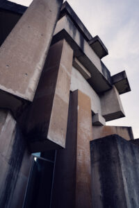 Wotrubakirche's dramatic angles and lines, creating a dynamic and visually striking appearance.