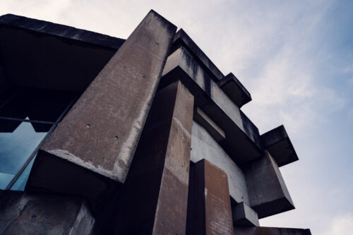 Wotrubakirche's silhouette against the sky, a distinctive landmark in Vienna's architectural landscape.