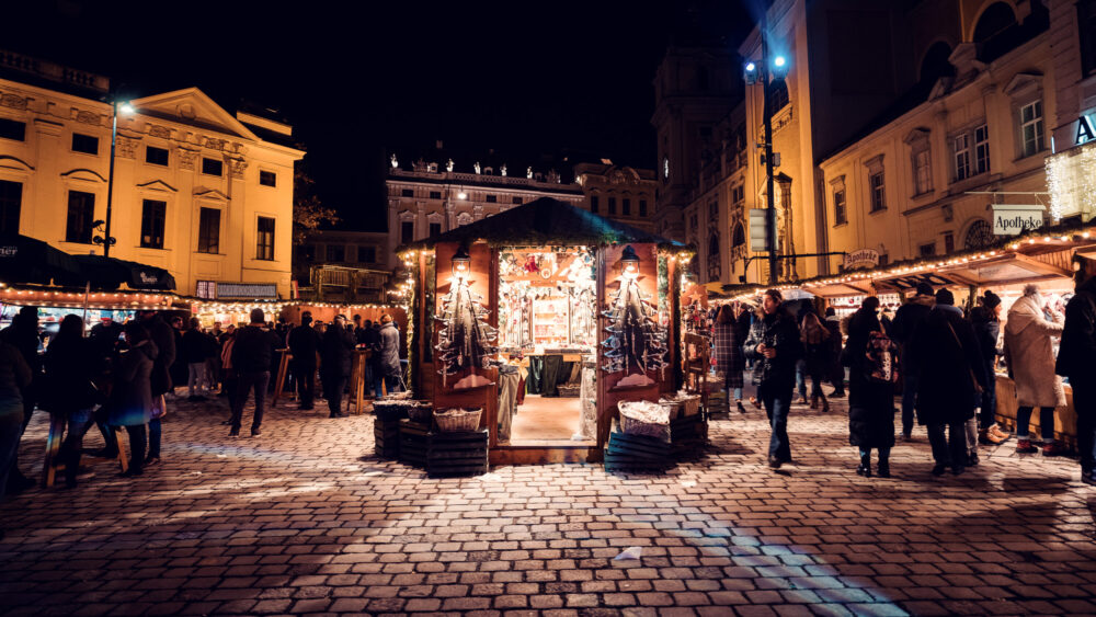 Festive atmosphere at the Freyung Christmas market, with twinkling lights.