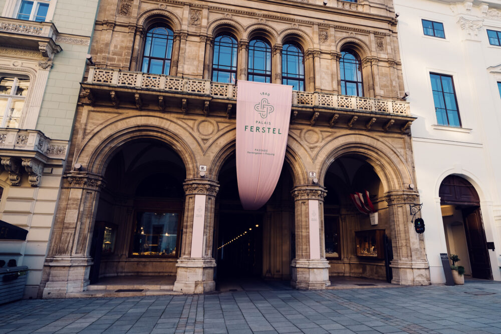 Palais Ferstel's grand entrance, inviting visitors to explore its historic halls and vibrant atmosphere in the heart of Vienna.