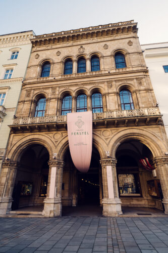 Intricate architectural details of Palais Ferstel, a landmark of Vienna's rich cultural heritage and 19th-century elegance.