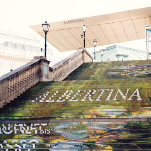 View of the entrance stairs and Albertina Museum signage in Vienna.