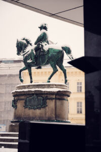 Close-up view of Archduke Albrecht statue in front of Albertina Museum.