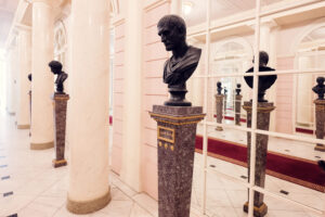 Elegant interior of Albertina Museum showcasing a classic sculpture exhibit.