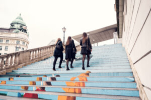 Colorful stairs leading to the Albertina Museum entrance in Vienna.